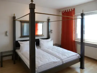 Ein Bett oder Betten in einem Zimmer der Unterkunft City Hotel
