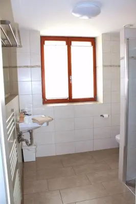 Ein Badezimmer in der Unterkunft greenpartment Boardinghouse Neustadt