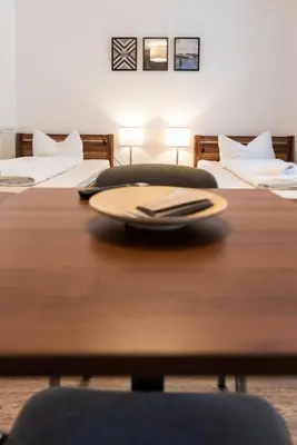 Ein Bett oder Betten in einem Zimmer der Unterkunft greenpartment Boardinghouse Neustadt