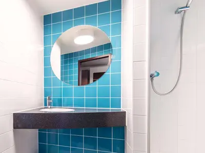 Ein Badezimmer in der Unterkunft B&B Hotel Rosenheim