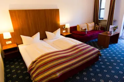 Ein Bett oder Betten in einem Zimmer der Unterkunft Gästehaus Rössler