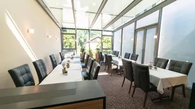 Ein Sitzbereich in der Unterkunft Hotel Lutter