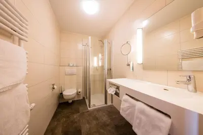 Ein Badezimmer in der Unterkunft Landhotel Endhart