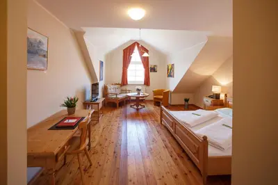 Ein Bett oder Betten in einem Zimmer der Unterkunft Il Plonner - Hotel Restaurant Biergarten