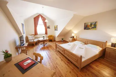 Ein Bett oder Betten in einem Zimmer der Unterkunft Il Plonner - Hotel Restaurant Biergarten