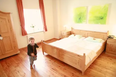 Ein Bett oder Betten in einem Zimmer der Unterkunft Il Plonner - Hotel Restaurant Biergarten
