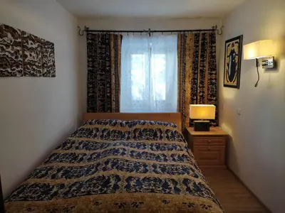 Ein Bett oder Betten in einem Zimmer der Unterkunft Künstlerhaus Weissgerbergütl