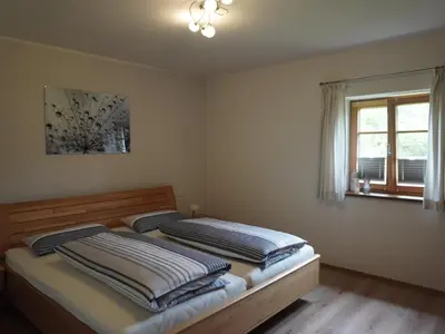 Ein Bett oder Betten in einem Zimmer der Unterkunft Ferienwohnung Am Feldbach