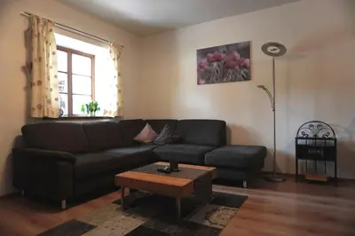 Ein Sitzbereich in der Unterkunft Ferienwohnung Am Feldbach