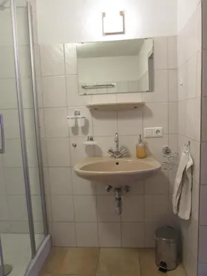Ein Badezimmer in der Unterkunft Biererhof