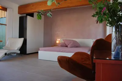 Ein Bett oder Betten in einem Zimmer der Unterkunft Studio Via Claudia Augusta