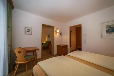 Ein Bett oder Betten in einem Zimmer der Unterkunft Parkhotel Sonnenhof