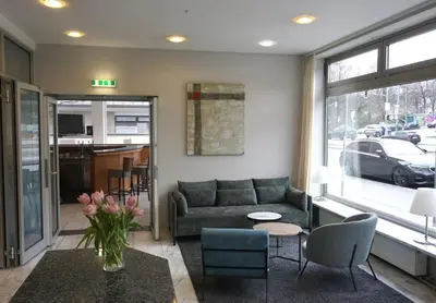 Ein Sitzbereich in der Unterkunft Hotel Senator München