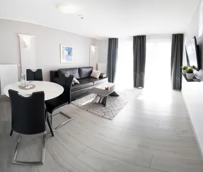Ein Sitzbereich in der Unterkunft ARABEST Aparthotel & Boardinghouse