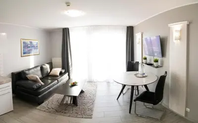 Ein Sitzbereich in der Unterkunft ARABEST Aparthotel & Boardinghouse