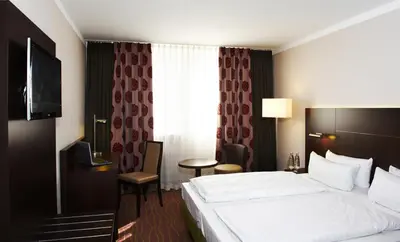 Ein Bett oder Betten in einem Zimmer der Unterkunft Stern Hotel Soller