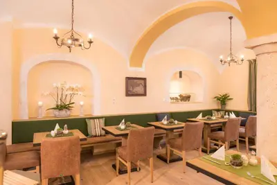 Ein Sitzbereich in der Unterkunft Hotel Bockmaier