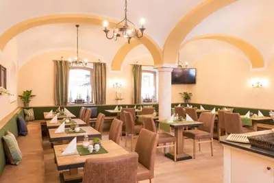 Ein Sitzbereich in der Unterkunft Hotel Bockmaier