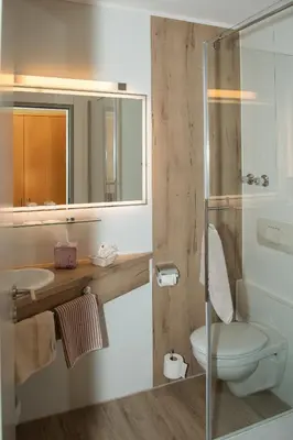 Ein Badezimmer in der Unterkunft Hotel Bockmaier