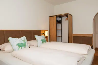 Ein Bett oder Betten in einem Zimmer der Unterkunft Hotel Bockmaier