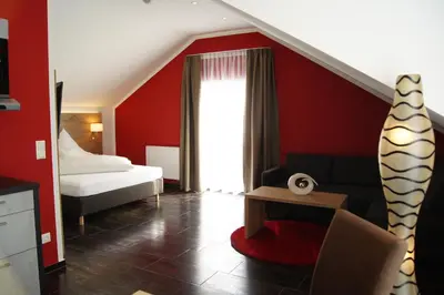 Ein Bett oder Betten in einem Zimmer der Unterkunft Gersthofer Auszeit