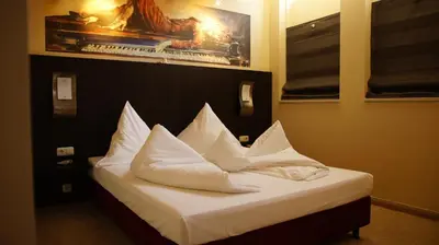 Ein Bett oder Betten in einem Zimmer der Unterkunft Gersthofer Auszeit
