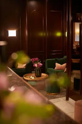 Ein Sitzbereich in der Unterkunft Hotel Metropol by Maier Privathotels
