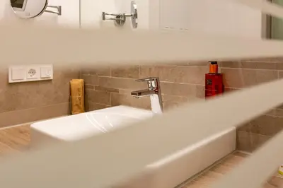 Ein Badezimmer in der Unterkunft Hotel MODI