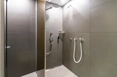 Ein Badezimmer in der Unterkunft Hotel MODI
