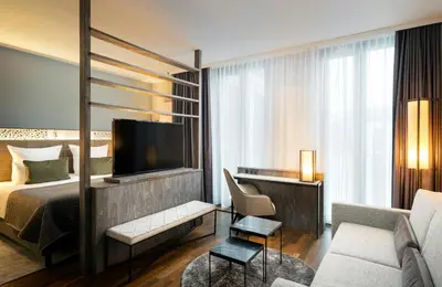Ein Bett oder Betten in einem Zimmer der Unterkunft Leonardo Royal Hotel Munich