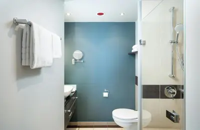 Ein Badezimmer in der Unterkunft Leonardo Royal Hotel Munich