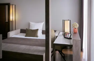 Ein Bett oder Betten in einem Zimmer der Unterkunft Leonardo Royal Hotel Munich