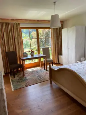 Ein Bett oder Betten in einem Zimmer der Unterkunft Gastezimmer Nahe Wesslinger See