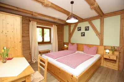 Ein Bett oder Betten in einem Zimmer der Unterkunft Pension Bergsee