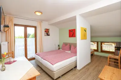 Ein Bett oder Betten in einem Zimmer der Unterkunft Pension Bergsee