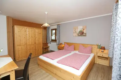 Ein Bett oder Betten in einem Zimmer der Unterkunft Pension Bergsee