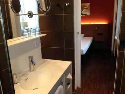 Ein Badezimmer in der Unterkunft Hotel Königstein