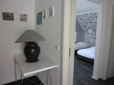 Ein Bett oder Betten in einem Zimmer der Unterkunft Hotel Bergbauer mit Late-Self-Check-IN
