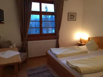 Ein Bett oder Betten in einem Zimmer der Unterkunft Berggasthof Hummelei