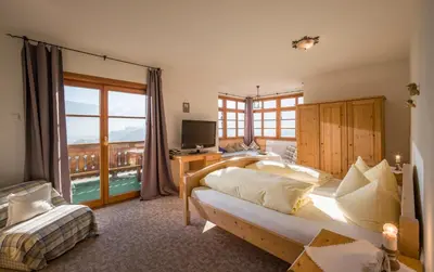 Ein Bett oder Betten in einem Zimmer der Unterkunft Berggasthof Hummelei