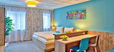 Ein Bett oder Betten in einem Zimmer der Unterkunft das MAX Appartementhaus