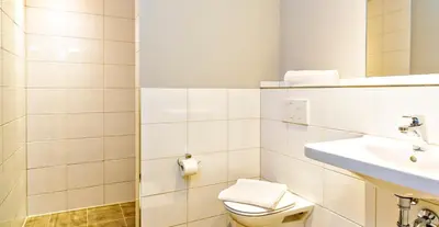 Ein Badezimmer in der Unterkunft das MAX Appartementhaus