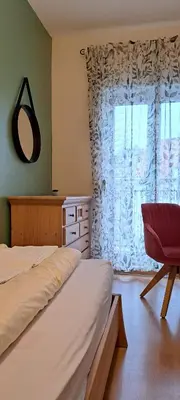 Ein Bett oder Betten in einem Zimmer der Unterkunft Backerwirt - Wohnen und Schlafen