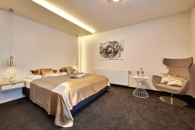 Ein Bett oder Betten in einem Zimmer der Unterkunft Hotel Alter Wirth