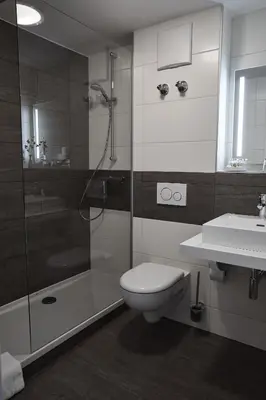 Ein Badezimmer in der Unterkunft Hotel Alter Wirth
