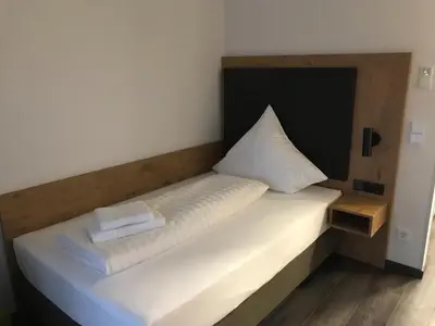 Ein Bett oder Betten in einem Zimmer der Unterkunft Waldschlößl