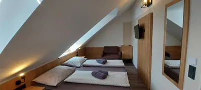 Ein Bett oder Betten in einem Zimmer der Unterkunft Pension DELAGERA