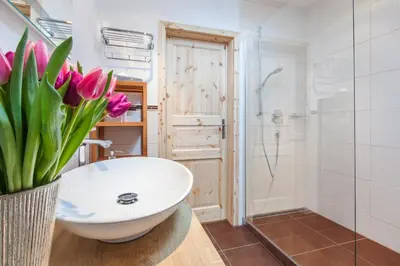 Ein Badezimmer in der Unterkunft Hotel Berlin Tegernsee