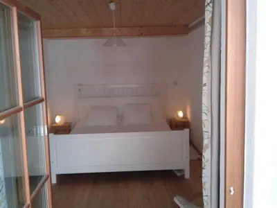 Ein Bett oder Betten in einem Zimmer der Unterkunft Haus Perlgut - Maraun Alessia