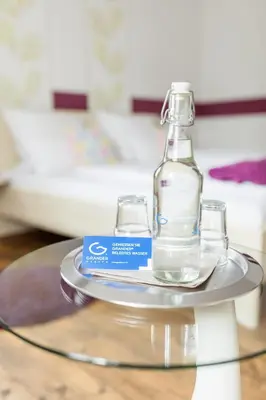 Ein Bett oder Betten in einem Zimmer der Unterkunft Hotel DAH-Inn